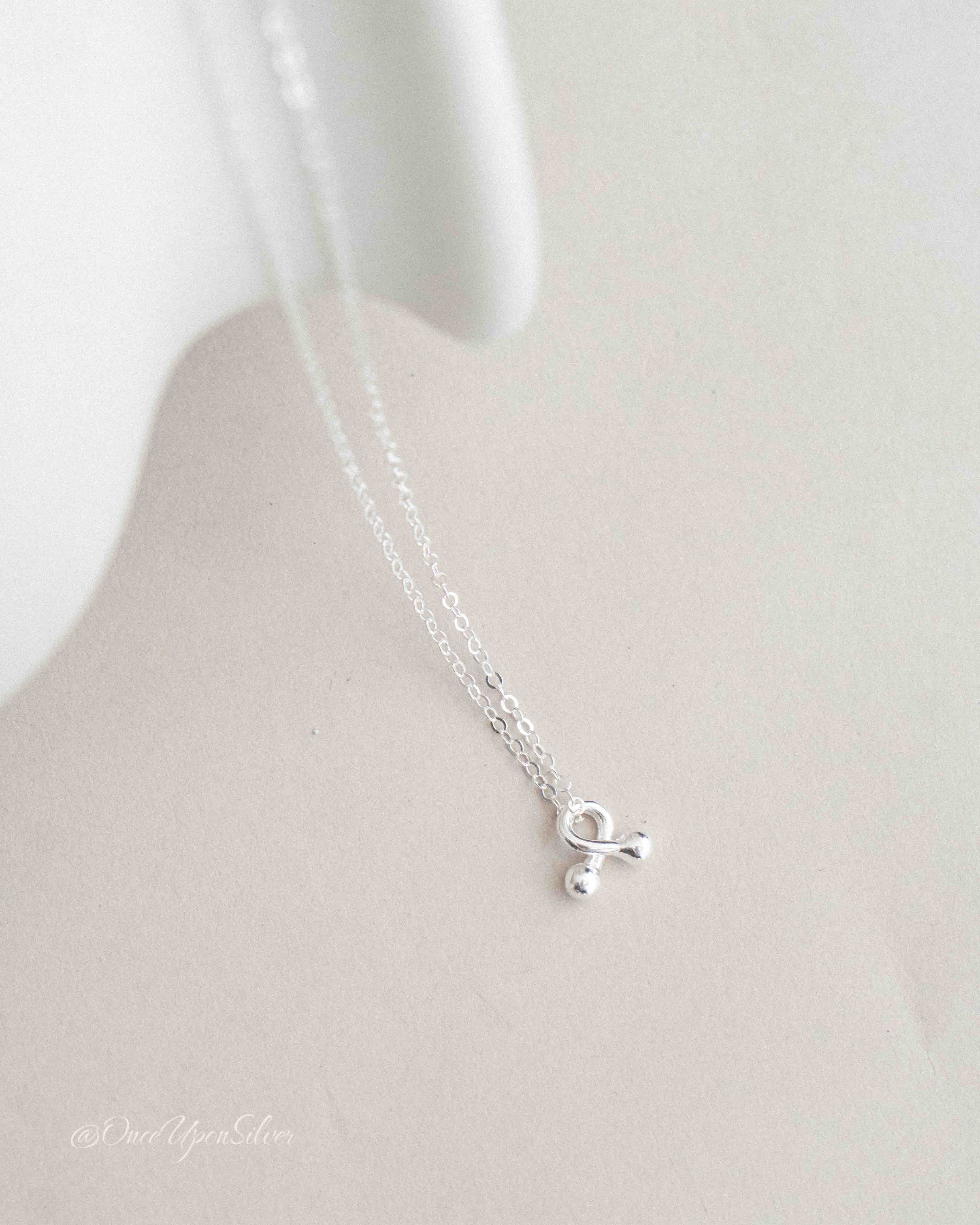Tiny Knot Necklace
